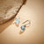 2.50 Carat Blue Topaz Dangle Earrings in Sterling Silver