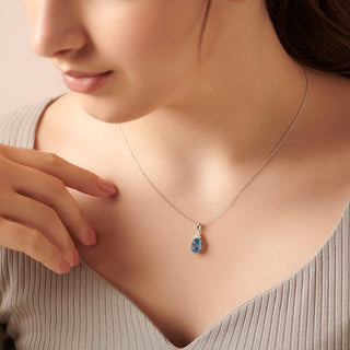 1.6 Carat Elongated Cushion Swiss Blue Topaz & Diamond Pendant Necklace in Sterling Silver