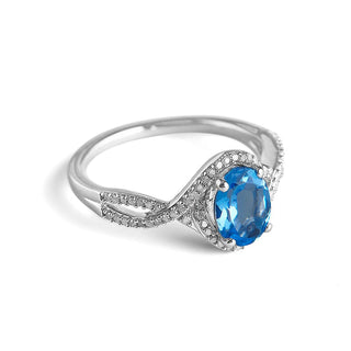 1.5 Carat Oval Shaped Swiss Blue Topaz and Diamond Twisted Ring in Sterling Silver