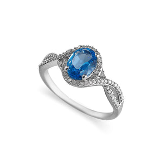 1.5 Carat Oval Shaped Swiss Blue Topaz and Diamond Twisted Ring in Sterling Silver