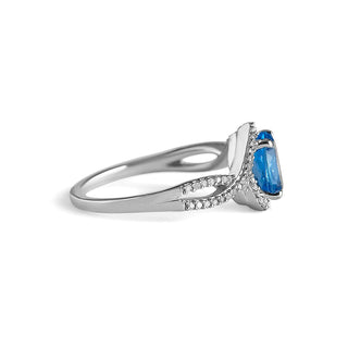 1.5 Carat Oval Shaped Swiss Blue Topaz and Diamond Twisted Ring in Sterling Silver